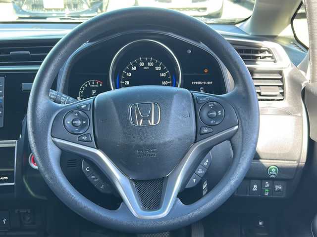 ホンダ フィット 13G F コンフォートED 長野県 2018(平30)年 0.6万km ルージュアメジストM ・純正7インチSDナビゲーション/CD ワンセグTV Bluetooth/・バックカメラ/・ビルトインETC/・ホンダセンシング/・レーンキープアシスト/・レーダークルーズコントロール/・アイドリングストップ/・横滑り防止装置/・ウィンカーミラー/・電動格納ミラー/・スマートキー/・エンジンプッシュスタート