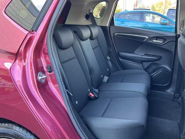 ホンダ フィット 13G F コンフォートED 長野県 2018(平30)年 0.6万km ルージュアメジストM ・純正7インチSDナビゲーション/CD ワンセグTV Bluetooth/・バックカメラ/・ビルトインETC/・ホンダセンシング/・レーンキープアシスト/・レーダークルーズコントロール/・アイドリングストップ/・横滑り防止装置/・ウィンカーミラー/・電動格納ミラー/・スマートキー/・エンジンプッシュスタート