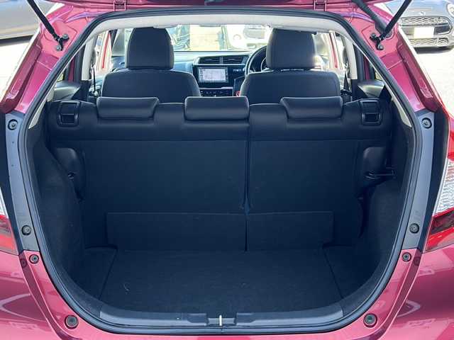 ホンダ フィット 13G F コンフォートED 長野県 2018(平30)年 0.6万km ルージュアメジストM ・純正7インチSDナビゲーション/CD ワンセグTV Bluetooth/・バックカメラ/・ビルトインETC/・ホンダセンシング/・レーンキープアシスト/・レーダークルーズコントロール/・アイドリングストップ/・横滑り防止装置/・ウィンカーミラー/・電動格納ミラー/・スマートキー/・エンジンプッシュスタート