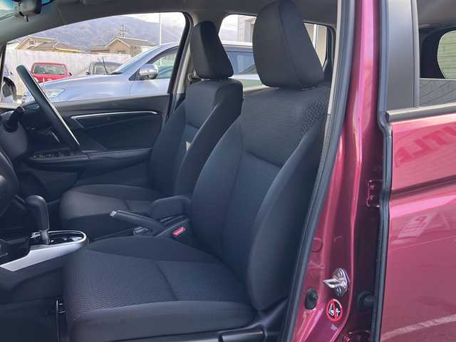 ホンダ フィット 13G F コンフォートED 長野県 2018(平30)年 0.6万km ルージュアメジストM ・純正7インチSDナビゲーション/CD ワンセグTV Bluetooth/・バックカメラ/・ビルトインETC/・ホンダセンシング/・レーンキープアシスト/・レーダークルーズコントロール/・アイドリングストップ/・横滑り防止装置/・ウィンカーミラー/・電動格納ミラー/・スマートキー/・エンジンプッシュスタート