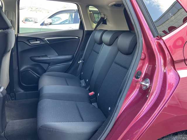 ホンダ フィット 13G F コンフォートED 長野県 2018(平30)年 0.6万km ルージュアメジストM ・純正7インチSDナビゲーション/CD ワンセグTV Bluetooth/・バックカメラ/・ビルトインETC/・ホンダセンシング/・レーンキープアシスト/・レーダークルーズコントロール/・アイドリングストップ/・横滑り防止装置/・ウィンカーミラー/・電動格納ミラー/・スマートキー/・エンジンプッシュスタート