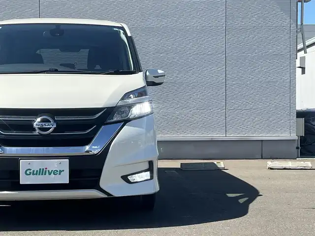 日産 セレナ ハイウェイスター 秋田県 2017(平29)年 8.5万km ブリリアントホワイトパール ４WD/衝突軽減システム/LEDヘッドライト/両側パワスラ/社外ナビ/フルセグ/社外アルミ/スマートキー/アイドリングストップ/プッシュスタート/クルーズコントロール/ステアリングスイッチ/フリップダウンモニター/純正エンジンスターター/社外フロアマット/純正ドアバイザー/オートライト/ダブルオートエアコン/パワーステアリング/パワーウィンドウ/レベライザー/横滑り防止/盗難防止装置/寒冷地仕様/電動格納ウィンカーミラー/取扱説明書