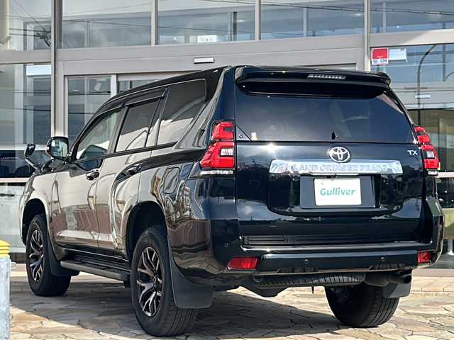 トヨタ ランドクルーザー プラド TX 静岡県 2021(令3)年 2.8万km アティチュードブラックマイカ 純正SDナビ/・CD/・DVD/・フルセグＴＶ/・Bluetooth/・USB/・AM/・FM/主要装備/・衝突軽減/・レーンキープ/・追従クルコン/・コーナーセンサー前後/・踏み間違い防止/・バックカメラ/・ビルトインETC/・ドラレコ前後/・MTモード付/・純正フロアマット/・社外/純正アルミホイール/・LEDヘッドライト/・オートハイビーム/・ヘッドライトウォッシャー/・スマートキー/・プッシュスタート