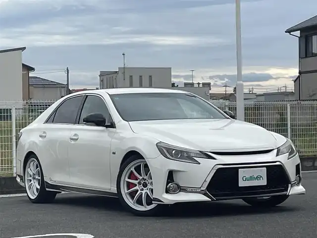 トヨタ マークＸ 250G Sパッケージ G’s 群馬県 2015(平27)年 8.6万km ホワイトパールクリスタルシャイン 純正7型SDナビ　NSZT-T64T/　(CD DVD Bluetooth フルセグTV　AM FM）/純正6.1型フリップダウンモニター　V6N-R61C/バックカメラ/ビルトインETC/LEDヘッドライト/オートライト/革巻きステアリング/ステアリングスイッチ/パドルシフト/クルーズコントロール/ハーフレザーシート/ウィンカーミラー/デュアルエアコン/WORK19インチAW/純正フロアマット/取扱説明書/保証書/スペアキー