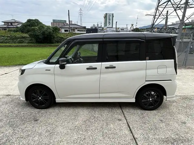 スズキ ソリオ HV SZ 長崎県 2023(令5)年 2.7万km ピュアホワイトパール/ガンメタリック2トーン 純正9インチナビ/（Bluetooth/フルセグ）/全方位カメラ/衝突軽減システム/レーンアシスト/レーダークルーズ/ETC/両側パワースライドドア/ヘッドアップディスプレイ/パドルシフト/前後ドライブレコーダー/バックソナー/純正15インチAW