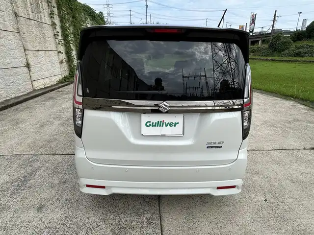 スズキ ソリオ HV SZ 長崎県 2023(令5)年 2.7万km ピュアホワイトパール/ガンメタリック2トーン 純正9インチナビ/（Bluetooth/フルセグ）/全方位カメラ/衝突軽減システム/レーンアシスト/レーダークルーズ/ETC/両側パワースライドドア/ヘッドアップディスプレイ/パドルシフト/前後ドライブレコーダー/バックソナー/純正15インチAW