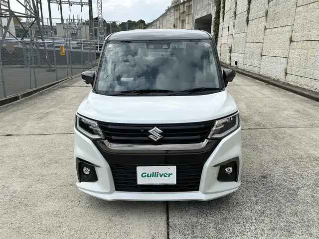スズキ ソリオ HV SZ 長崎県 2023(令5)年 2.7万km ピュアホワイトパール/ガンメタリック2トーン 純正9インチナビ/（Bluetooth/フルセグ）/全方位カメラ/衝突軽減システム/レーンアシスト/レーダークルーズ/ETC/両側パワースライドドア/ヘッドアップディスプレイ/パドルシフト/前後ドライブレコーダー/バックソナー/純正15インチAW