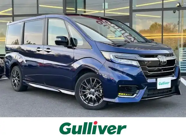 ホンダ ステップワゴン スパーダ eHEV G EXホンダS 栃木県 2020(令2)年 8万km オブシダンブルーパール ホンダセンシング/フリップダウンモニター/純正9インチナビ/フルセグTV/DVD/Bluetooth/USB/全周囲カメラ/ビルトインETC/前席シートヒーター/両側パワースライドドア/アダプティブクルーズコントロール/プッシュスタート/ステアリングリモコン/LEDオートライト/LEDフォグランプ/社外17インチAW/アイドリングストップ/横滑り防止装置/電動格納ミラー/わくわくゲート