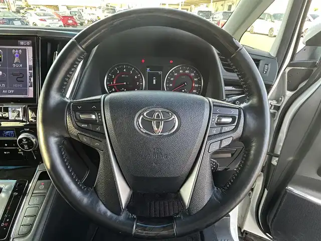 トヨタ アルファード S Cパッケージ 岡山県 2019(令1)年 8.3万km ホワイトパールクリスタルシャイン 登録時走行距離82138km/ALPINE11インチナビ/フルセグTV(AM/FM/CD/DVD/Bluetooth)/ALPINE12.8インチフリップダウンモニター/バックカメラ/両側パワースライドドア/ビルトインETC/ドライブレコーダー/パワーバックドア/トヨタセーフティセンス/・プリクラッシュセーフティ/・レーダークルーズコントロール/・オートマチックハイビーム/・レーンディバーチャーアラート/オートブレーキホールド/横滑り防止装置/本革シート/D/N席シートヒーター/D/N席ベンチレーション/ステアリングヒーター/オットマン/18インチ純正AW/純正フロアマット