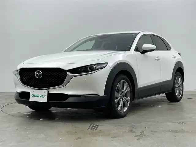 マツダ ＣＸ－３０ XD プロアクティブ 岡山県 2023(令5)年 2万km スノーフレイクホワイトパールマイカ 純正10.25インチディスプレイオーディオ/(Bluetooth/USB/Carplay/フルセグTV/HDMI)/全方位カメラ/ワイヤレス充電/電動リアゲート/パドルシフト/ヘッドアップディスプレイ/コーナーセンサー(前後)/オートハイビーム/LEDヘッドライト/レーンアシスト/アイドリングストップ/オートブレーキホールド/スマートキー(1本)/社外ドライブレコーダー(前)/社外フロアマット/純正18インチアルミホイール