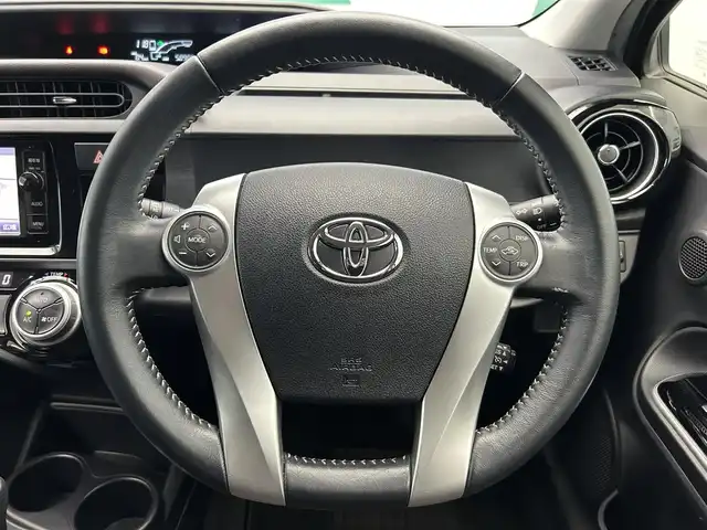 トヨタ アクア G 鹿児島県 2016(平28)年 5.9万km シルバーM 禁煙車/純正ナビ/(フルセグ/Bluetooth/DVD/CD)/バックカメラ/社外ETC/クルーズコントロール/トヨタセーフティセンスＣ/　・プリクラッシュセーフティシステム（対車両）/　・レーンディパーチャーアラート/　・オートマチックハイビーム/ステアリングリモコン/電動格納ミラー/ステアリングリモコン/純正フロアマット/ドアバイザー/オートライト/ECO/EVモード
