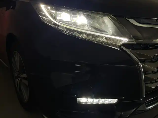 ホンダ オデッセイ ハイブリッド アブソルート・EXホンダセンジング 群馬県 2020(令2)年 2.4万km プレミアムヴィーナスブラックP 純正9インチHondaインターナビ/（フルセグＴＶ/BT/CD/DVD/AM/FM）/ビルトインETC2.0/===============/マルチビューカメラシステム/スマートパーキングアシスト/両側パワースライドドア/前席シートヒーター/前席パワーシート/後退出庫サポート/ブラインドスポットモニター/ホンダセンシング/・衝突軽減ブレーキ〈CMBS〉/・誤発進抑制機能/・歩行者事故低減ステアリング/・路外逸脱抑制機能/・渋滞追従機能付ACC〈アダプティブ・クルーズ・コントロール〉/・LKAS〈車線維持支援システム〉/・先行車発進お知らせ機能/・標識認識機能/AC100V電源/デジタルミラー型ドライブレコーダー/大型アームレスト・センターコンソール