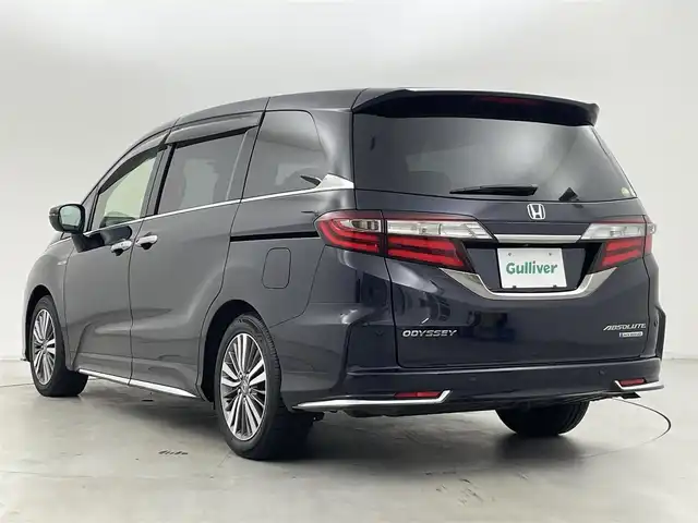 ホンダ オデッセイ ハイブリッド アブソルート・EXホンダセンジング 群馬県 2020(令2)年 2.4万km プレミアムヴィーナスブラックP 純正9インチHondaインターナビ/（フルセグＴＶ/BT/CD/DVD/AM/FM）/ビルトインETC2.0/===============/マルチビューカメラシステム/スマートパーキングアシスト/両側パワースライドドア/前席シートヒーター/前席パワーシート/後退出庫サポート/ブラインドスポットモニター/ホンダセンシング/・衝突軽減ブレーキ〈CMBS〉/・誤発進抑制機能/・歩行者事故低減ステアリング/・路外逸脱抑制機能/・渋滞追従機能付ACC〈アダプティブ・クルーズ・コントロール〉/・LKAS〈車線維持支援システム〉/・先行車発進お知らせ機能/・標識認識機能/AC100V電源/デジタルミラー型ドライブレコーダー/大型アームレスト・センターコンソール