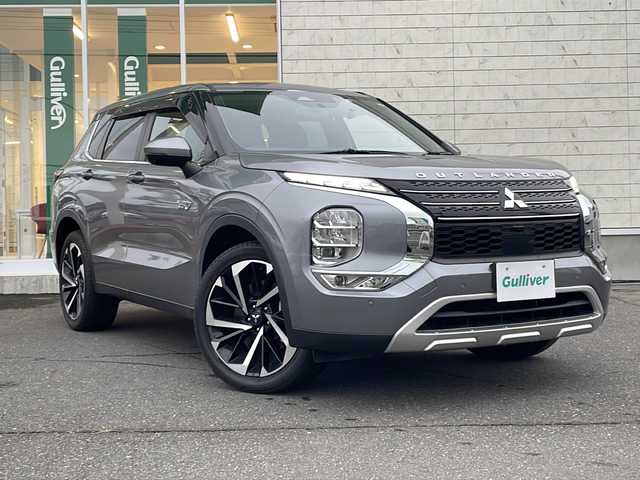 三菱 アウトランダー ＰＨＥＶ G 岩手県 2022(令4)年 6.3万km チタニウムグレーメタリック 純正メモリナビ/全周囲モニター/パドルシフト/パワーバックドア/AC1500W電源/ワイヤレス充電/レーダークルーズコントロール/ステアリングヒーター/シートヒーター/パワーシート/ハーフレザーシート/ETC2.0/電動格納ミラー/純正フロアマット/横滑り防止装置/盗難防止装置/LEDヘッドライト/フォグランプ