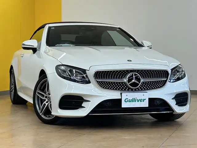 メルセデス・ベンツ Ｅ２００ カブリオレ スポーツ 群馬県 2019(令1)年 1.9万km ダイヤモンドホワイト レーダーセーフティーパッケージ/・アクティブブレーキアシスト/・レーンチェンジアシスト/・ブラインドスポットアシスト/・アダプティブクルーズコントロール/・クリアランスソナー/・オートマチックハイビーム/Burmesterサウンド/純正ナビ/　　フルセグTV/    BT/SD/USB/AM/FM/AppleCarPlay/全方位カメラ/LEDオートライト/本革シート/パワーシート/シートヒーター/エアシート/シートメモリー/純正19インチAW/パドルシフト/ステアリングスイッチ/ステアリングヒーター/電動パーキングブレーキ/アイドリングストップ/ヘッドアップディスプレイ/ビルトインETC2.0/スマートキー