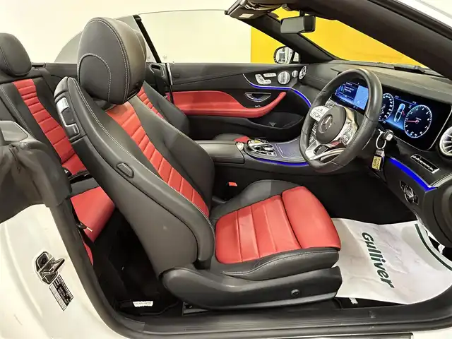 メルセデス・ベンツ Ｅ２００ カブリオレ スポーツ 群馬県 2019(令1)年 1.9万km ダイヤモンドホワイト レーダーセーフティーパッケージ/・アクティブブレーキアシスト/・レーンチェンジアシスト/・ブラインドスポットアシスト/・アダプティブクルーズコントロール/・クリアランスソナー/・オートマチックハイビーム/Burmesterサウンド/純正ナビ/　　フルセグTV/    BT/SD/USB/AM/FM/AppleCarPlay/全方位カメラ/LEDオートライト/本革シート/パワーシート/シートヒーター/エアシート/シートメモリー/純正19インチAW/パドルシフト/ステアリングスイッチ/ステアリングヒーター/電動パーキングブレーキ/アイドリングストップ/ヘッドアップディスプレイ/ビルトインETC2.0/スマートキー