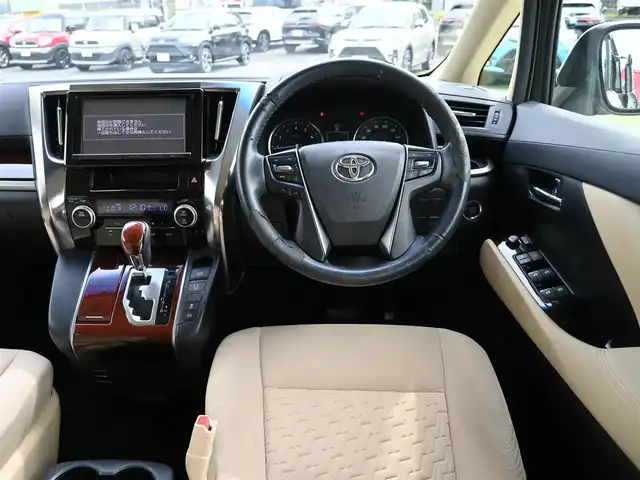 トヨタ ヴェルファイア X 千葉県 2015(平27)年 6.9万km ホワイトパールクリスタルシャイン 両側パワースライドドア/バックドアイージークローザー/9インチ純正SDナビ/地デジTV/【DVD/CD再生機能　Bluetooth接続】/バックカメラ/フリップダウンモニター/ドライブレコーダー（前後撮影）/革巻きステアリング/ステアリングスイッチ/ETC/LEDヘッドライト/フォグライト/ウインカーミラー/クリアランスソナー/純正16インチアルミホイル/サイド/カーテンエアバッグ/スマートキー