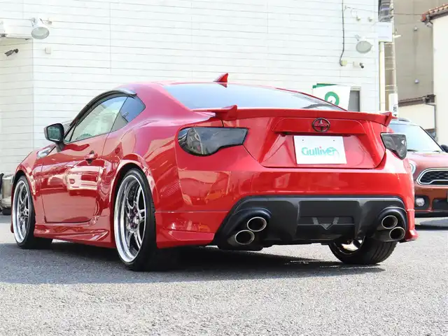 トヨタ ８６ GT リミテッド 神奈川県 2012(平24)年 5.7万km ライトニングレッド モデリスタエアロ（F・S・R）/TOM’S4本出しマフラー/：TOM’S4スモークテールレンズ/車高調/社外メモリナビ/Bluetoothオーディオ/バックカメラ/プッシュスタート/ドライブレコーダー（前後）/社外シルバーメッキ19インチアルミホイール/：235/35R19/ハーフレザーシート/：シートヒーター/フロアマット