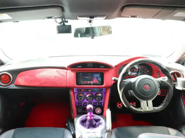 トヨタ ８６ GT リミテッド 神奈川県 2012(平24)年 5.7万km ライトニングレッド モデリスタエアロ（F・S・R）/TOM’S4本出しマフラー/：TOM’S4スモークテールレンズ/車高調/社外メモリナビ/Bluetoothオーディオ/バックカメラ/プッシュスタート/ドライブレコーダー（前後）/社外シルバーメッキ19インチアルミホイール/：235/35R19/ハーフレザーシート/：シートヒーター/フロアマット