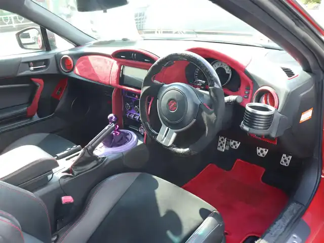 トヨタ ８６ GT リミテッド 神奈川県 2012(平24)年 5.7万km ライトニングレッド モデリスタエアロ（F・S・R）/TOM’S4本出しマフラー/：TOM’S4スモークテールレンズ/車高調/社外メモリナビ/Bluetoothオーディオ/バックカメラ/プッシュスタート/ドライブレコーダー（前後）/社外シルバーメッキ19インチアルミホイール/：235/35R19/ハーフレザーシート/：シートヒーター/フロアマット