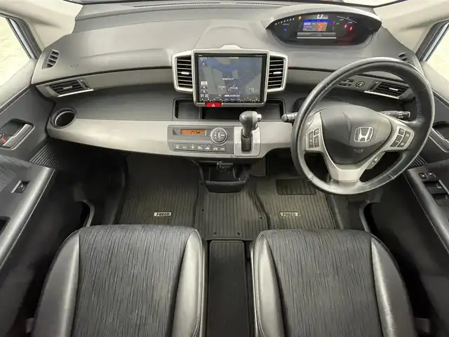 ホンダ フリード ハイブリット ジャストセレクション 福島県 2012(平24)年 12.2万km プレミアムブルーオパールメタリック 純正ナビゲーション/・型式：VXM-135VFN/・TV/Bluetooth/CD/DVD/AM・FM/SD/・バックカメラ/・ETC/両側パワースライドドア/革巻きステアリング/・ステアリングスイッチ/スマートキー/・スペアキー/HIDライト/純正フロアマット/ドアバイザー/電動格納ウィンカーミラー