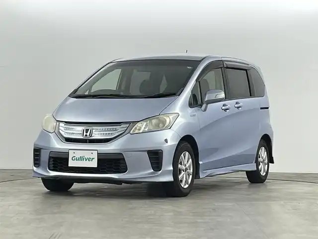 ホンダ フリード ハイブリット ジャストセレクション 福島県 2012(平24)年 12.2万km プレミアムブルーオパールメタリック 純正ナビゲーション/・型式：VXM-135VFN/・TV/Bluetooth/CD/DVD/AM・FM/SD/・バックカメラ/・ETC/両側パワースライドドア/革巻きステアリング/・ステアリングスイッチ/スマートキー/・スペアキー/HIDライト/純正フロアマット/ドアバイザー/電動格納ウィンカーミラー
