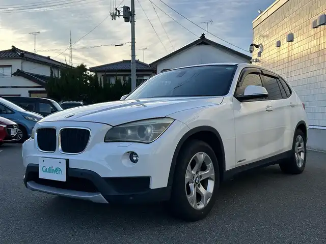 ＢＭＷ Ｘ１ xDrive 20i ファッショニスタ 山形県 2013(平25)年 12.7万km アルピンホワイトⅢ 4WD/純正HDDナビ/・AM/FM/CD/DVD/アイドリングストップ/コーナーセンサー/横滑り防止装置/盗難防止装置/LEDヘッドライト/オートライト/フロントフォグランプ/レザーシート/パワーシート（D/N席）/シートヒーター（D/N席）/バックカメラ/レーダー探知機/純正フロアマット/純正ドアバイザー