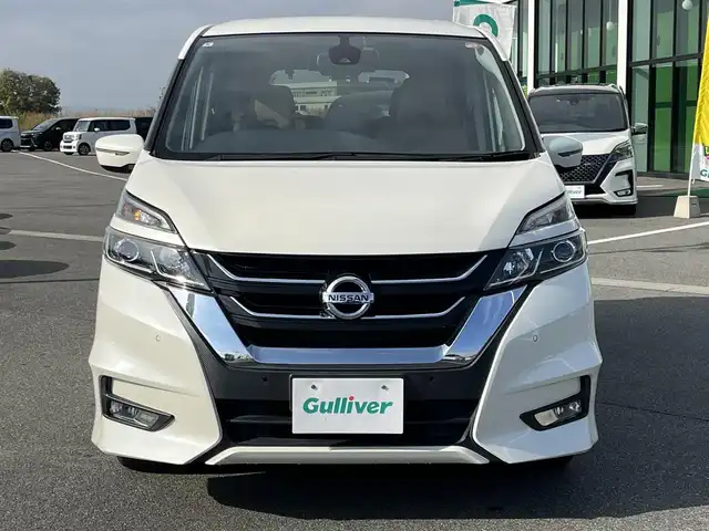 日産 セレナ ハイウェイスター G プロパイロットED 奈良県 2016(平28)年 6万km ブリリアントホワイトパール 純正9インチナビ（MM516D-L）/（フルセグ/BT/CD/DVD）/carrozzeria10インチフリップダウンモニター/（TVM-FW1020）/プロパイロット/バックカメラ/前後コーナーセンサー/衝突軽減システム/レーンキープアシスト/両側パワースライドドア/ハーフレザーシート（ブラウンXベージュ）/前席シートヒーター/後席サンシェード/LEDヘッドライト/オートライト/前方ドライブレコーダー/純正16インチAW/取り扱い説明書/スペアキーX1