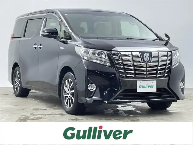 トヨタ アルファードハイブリット G Fパッケージ 千葉県 2017(平29)年 3万km ブラック 禁煙車/4WD/純正ディスプレイオーディオナビ/・CD/DVD/BT/フルセグTV/12.1型フリップダウンモニター/バックカメラ/両側パワースライドドア/プリクラッシュセーフティ/インテリジェントクリアランスソナー/レザーシート/前席パワーシート/前席シートヒーター/レーダークルーズコントロール/LEDヘッドライト/オートハイビーム/フォグランプ/パワーバックドア/ビルトインETC/AC100V1500W電源/スマートキー/純正17インチアルミホイール