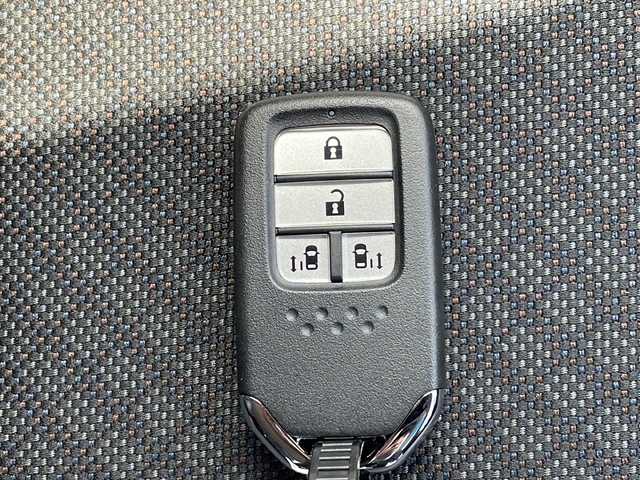 ホンダ フリード ハイブリット G ホンダセンシング 岩手県 2020(令2)年 3.2万km プラチナホワイトパール 純正ＳＤナビ　/バックカメラ　/両側パワースライドドア　/前後ドラレコ　/クルーズコントロール/追従走行/衝突被害軽減　/コーナーセンサー　/ＬＥＤヘッドライト　/プッシュスタート　/アクティブコーナリングライト/ワンセグテレビ/ETC/ドアバイザー