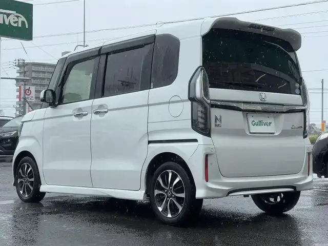 ホンダ Ｎ ＢＯＸ カスタム G L ホンダセンシング 愛媛県 2020(令2)年 3.8万km プラチナホワイトパール 純正ギャザーズナビ VXU-207VBi/(AM.FM.CD.DVD.BT.フルセグ.SD)/純正ドライブレコーダー/ホンダセンシング/・アダプティブ・クルーズ・コントロール（ACC）/・車線維持支援システム（LKAS）/・衝突軽減ブレーキ（CMBS）/・誤発進抑制機能（前進）/・歩行者事故低減ステアリング/・路外逸脱抑制機能/・先行車発進お知らせ機能/・標識認識機能/・オートハイビーム/・誤発進抑制機能（後進）/両側パワースライドドア/バックカメラ/ＬＥＤヘッドライト/ビルトインＥＴＣ/純正アルミホイール/ＵＳＢ充電２口