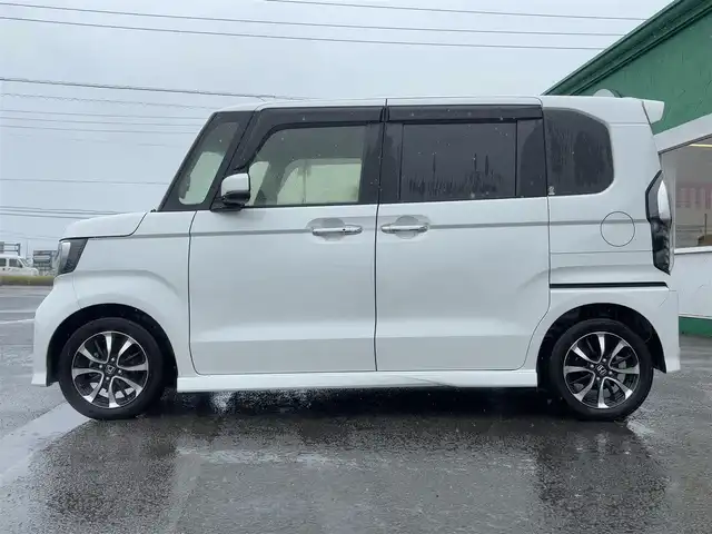 ホンダ Ｎ ＢＯＸ カスタム G L ホンダセンシング 愛媛県 2020(令2)年 3.8万km プラチナホワイトパール 純正ギャザーズナビ VXU-207VBi/(AM.FM.CD.DVD.BT.フルセグ.SD)/純正ドライブレコーダー/ホンダセンシング/・アダプティブ・クルーズ・コントロール（ACC）/・車線維持支援システム（LKAS）/・衝突軽減ブレーキ（CMBS）/・誤発進抑制機能（前進）/・歩行者事故低減ステアリング/・路外逸脱抑制機能/・先行車発進お知らせ機能/・標識認識機能/・オートハイビーム/・誤発進抑制機能（後進）/両側パワースライドドア/バックカメラ/ＬＥＤヘッドライト/ビルトインＥＴＣ/純正アルミホイール/ＵＳＢ充電２口