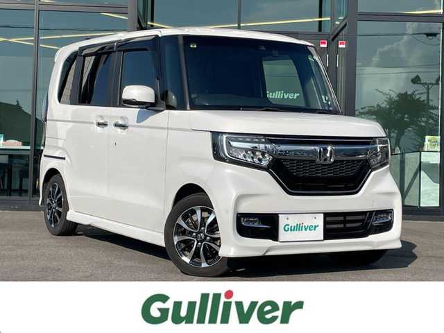 ホンダ Ｎ ＢＯＸ カスタム G L ホンダセンシング 愛媛県 2020(令2)年 3.8万km プラチナホワイトパール 純正ギャザーズナビ VXU-207VBi/(AM.FM.CD.DVD.BT.フルセグ.SD)/純正ドライブレコーダー/ホンダセンシング/・アダプティブ・クルーズ・コントロール（ACC）/・車線維持支援システム（LKAS）/・衝突軽減ブレーキ（CMBS）/・誤発進抑制機能（前進）/・歩行者事故低減ステアリング/・路外逸脱抑制機能/・先行車発進お知らせ機能/・標識認識機能/・オートハイビーム/・誤発進抑制機能（後進）/両側パワースライドドア/バックカメラ/ＬＥＤヘッドライト/ビルトインＥＴＣ/純正アルミホイール/ＵＳＢ充電２口