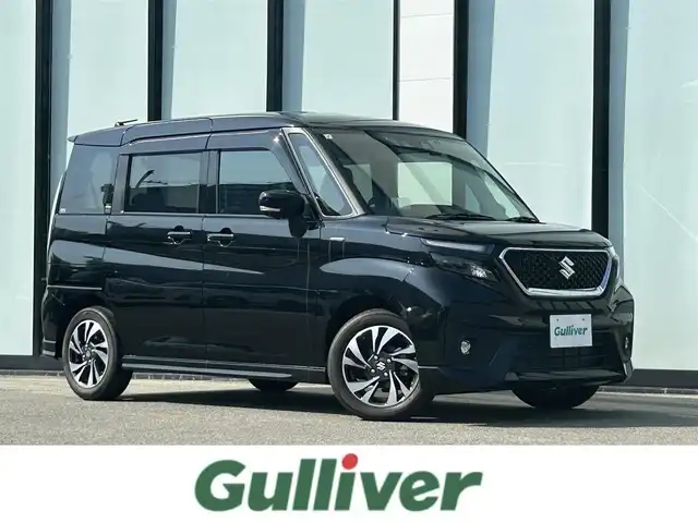 スズキ ソリオ バンディット HV MV 大阪府 2021(令3)年 1.5万km スーパーブラックパール 純正８インチナビ/   フルセグTV/CD/DVD/Bluetooth/USB/全方位モニター/衝突軽減ブレーキ/横滑り防止装置/コーナーセンサー/へッドアップディスプレイ/片側パワースライドドア/レーダークルーズコントロール/レーンキープアシスト/アイドリングストップ/前後ドライブレコーダー/純正15インチアルミホイール/純正フロアマット/プッシュスタート/スマートキー/ＥＴＣ/ＬＥＤ/禁煙車