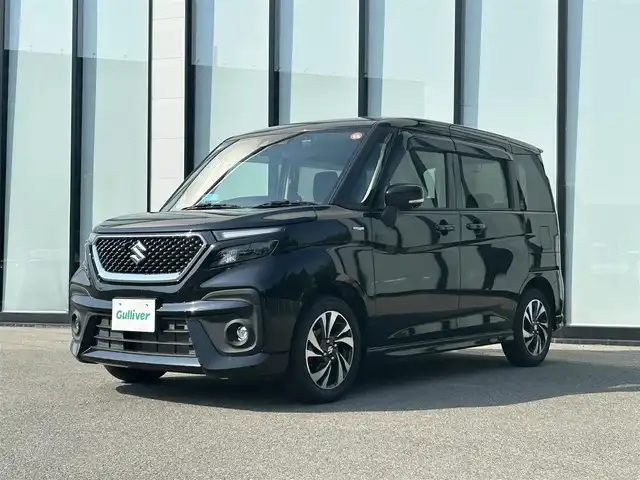 スズキ ソリオ バンディット HV MV 大阪府 2021(令3)年 1.5万km スーパーブラックパール 純正８インチナビ/   フルセグTV/CD/DVD/Bluetooth/USB/全方位モニター/衝突軽減ブレーキ/横滑り防止装置/コーナーセンサー/へッドアップディスプレイ/片側パワースライドドア/レーダークルーズコントロール/レーンキープアシスト/アイドリングストップ/前後ドライブレコーダー/純正15インチアルミホイール/純正フロアマット/プッシュスタート/スマートキー/ＥＴＣ/ＬＥＤ/禁煙車