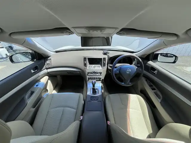 日産 スカイライン 250GT 三重県 2007(平19)年 11.8万km ホワイトパール 純正ナビ（Bluetooth/FM/AM/CD/DVD/AUX/MusicBox）/ETC/バックカメラ/サイドカメラ/ステアリングスイッチ/純正フロアマット/ドアバイザー/パワーシート（運転席/助手席）