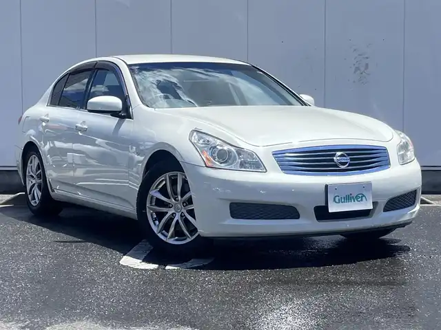 日産 スカイライン 250GT 三重県 2007(平19)年 11.8万km ホワイトパール 純正ナビ（Bluetooth/FM/AM/CD/DVD/AUX/MusicBox）/ETC/バックカメラ/サイドカメラ/ステアリングスイッチ/純正フロアマット/ドアバイザー/パワーシート（運転席/助手席）