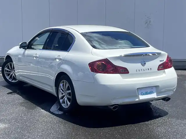 日産 スカイライン 250GT 三重県 2007(平19)年 11.8万km ホワイトパール 純正ナビ（Bluetooth/FM/AM/CD/DVD/AUX/MusicBox）/ETC/バックカメラ/サイドカメラ/ステアリングスイッチ/純正フロアマット/ドアバイザー/パワーシート（運転席/助手席）