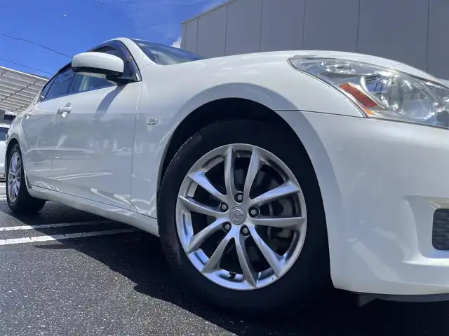 日産 スカイライン 250GT 三重県 2007(平19)年 11.8万km ホワイトパール 純正ナビ（Bluetooth/FM/AM/CD/DVD/AUX/MusicBox）/ETC/バックカメラ/サイドカメラ/ステアリングスイッチ/純正フロアマット/ドアバイザー/パワーシート（運転席/助手席）