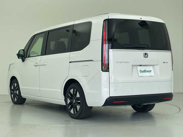 ホンダ ステップワゴン eHEV エアー EX 愛知県 2025(令7)年 0.1千km プラチナホワイトパール 登録済未使用車 4km/純正11.4型ナビ/・Bluetooth/・CD/DVD/・AppleCarPlay/・フルセグテレビ/純正15.6型フリップダウンモニター/バックカメラ/シートヒーター/パワーバックドア/オットマン/スマートキー/両側パワースライドドア/レーダークルーズコントロール/衝突軽減ブレーキ/レーンキープアシスト/ブラインドスポットモニター/LEDヘッドライト/LEDフォグランプ