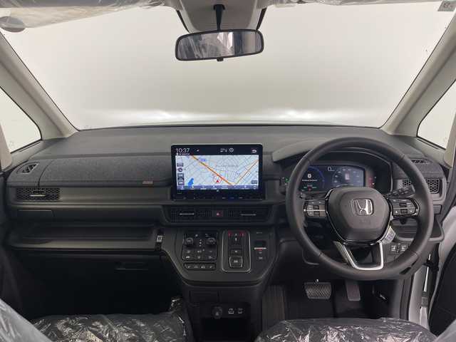 ホンダ ステップワゴン eHEV エアー EX 愛知県 2025(令7)年 0.1千km プラチナホワイトパール 登録済未使用車 4km/純正11.4型ナビ/・Bluetooth/・CD/DVD/・AppleCarPlay/・フルセグテレビ/純正15.6型フリップダウンモニター/バックカメラ/シートヒーター/パワーバックドア/オットマン/スマートキー/両側パワースライドドア/レーダークルーズコントロール/衝突軽減ブレーキ/レーンキープアシスト/ブラインドスポットモニター/LEDヘッドライト/LEDフォグランプ