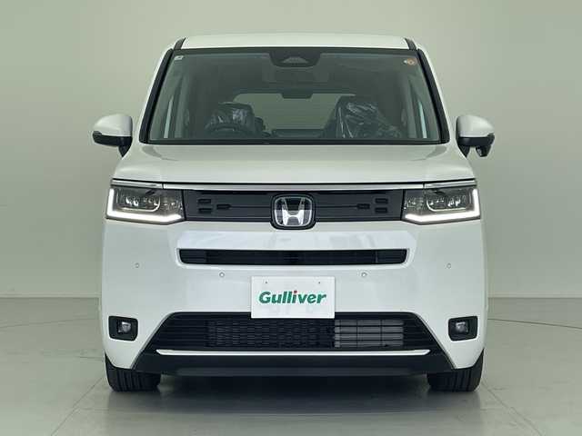 ホンダ ステップワゴン eHEV エアー EX 愛知県 2025(令7)年 0.1千km プラチナホワイトパール 登録済未使用車 4km/純正11.4型ナビ/・Bluetooth/・CD/DVD/・AppleCarPlay/・フルセグテレビ/純正15.6型フリップダウンモニター/バックカメラ/シートヒーター/パワーバックドア/オットマン/スマートキー/両側パワースライドドア/レーダークルーズコントロール/衝突軽減ブレーキ/レーンキープアシスト/ブラインドスポットモニター/LEDヘッドライト/LEDフォグランプ
