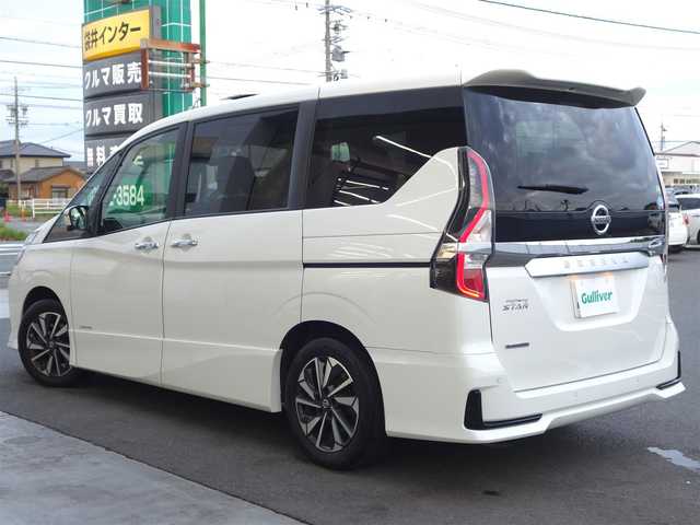 日産 セレナ ハイウェイスター G 大分県 2019(令1)年 7.7万km ブリリアントホワイトパール ワンオーナー／禁煙車/車検R8年9月29日/セーフティパッケージB/　・プロパイロット/　・インテリジェントエマージェンシーブレーキ/　・踏み間違い衝突防止アシスト/　・後側方車両検知警報/　・後後方衝突防止支援システム/　・車線逸脱防止支援システム/　・後退時車両検知警報/　・ふらつき警報/　・標識検知機能/　　電動パーキング/　　オートブレーキホールド/BSM/純正10インチSDナビ/　CD/DVD/BT/SD/MSV/iPod/USB/フルセグTV/アラウンドビューモニター/純正フリップダウンモニター/ビルトインETC/デジタルインナーミラー/純正前後ドライブレコーダー/両側パワースライドドア/スマートキー／プッシュスタート/LEDヘッドライト／フォグランプ/純正フロアマット/取扱説明書／保証書
