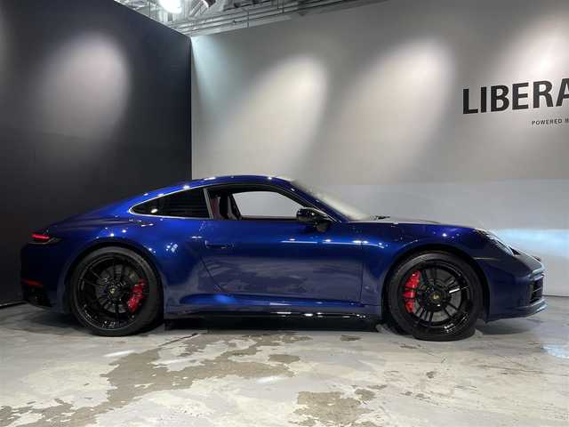 ポルシェ ポルシェ ９１１ カレラ4 GTS 道央・札幌 2023(令5)年 0.9万km 紺Ｍ フロントアクスルリフティングシステム/ボルドーレッドレザーインテリア/スポーツクロノパッケージ/スポーツエキゾースト/レーンチェンジアシスト/トラフィックジャム付ＡＣＣ/ターボＳホイール２０／２１インチ/ゲンチアンブルーメタリック/スペアキーレス/新車時保証書/取扱説明書