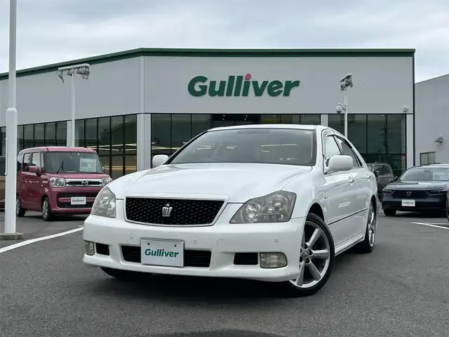 トヨタ クラウン アスリート プレミアムエディション 愛媛県 2007(平19)年 4.7万km ホワイトパールクリスタルシャイン 登録時走行距離：46550km/メーカーOP純正ナビ/ビルトインETC/バックカメラ/クルコン/パーキングアシスト/寒冷地仕様/盗難防止装置/横滑り防止装置/サンルーフ/シートメモリー/D+Nシートヒーター/D+Nパワーシート/オートライト/エンジンスタートボタン/スマートキー/スペアキー1本/エアロ/純正アルミホイール/純正フロアマット