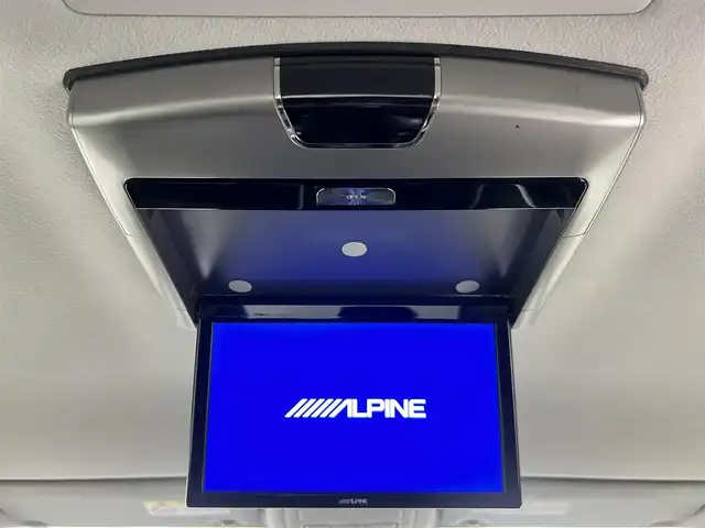 トヨタ エスクァイア ハイブリッド Gi 佐賀県 2015(平27)年 6.5万km スパークリングブラックパールクリスタルシャイン 社外ストラーダ製7インチナビ/フルセグTV/CD/DVD/Bluetooth/アルパイン製10.1インチフリップダウンモニター/トヨタプレミアムサンドシステム/バックカメラ/クルーズコントロール/横滑り防止装置/オートライト/LEDヘッドライト/フォグライト/ビルトインETC/両側パワースライドドア/ワイヤレス充電器/運転席・助手席シートヒーター/合皮シート/後席オートエアコン/純正フロアマット/純正15インチアルミホイール/プッシュスタート