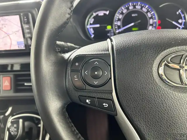 トヨタ エスクァイア ハイブリッド Gi 佐賀県 2015(平27)年 6.5万km スパークリングブラックパールクリスタルシャイン 社外ストラーダ製7インチナビ/フルセグTV/CD/DVD/Bluetooth/アルパイン製10.1インチフリップダウンモニター/トヨタプレミアムサンドシステム/バックカメラ/クルーズコントロール/横滑り防止装置/オートライト/LEDヘッドライト/フォグライト/ビルトインETC/両側パワースライドドア/ワイヤレス充電器/運転席・助手席シートヒーター/合皮シート/後席オートエアコン/純正フロアマット/純正15インチアルミホイール/プッシュスタート