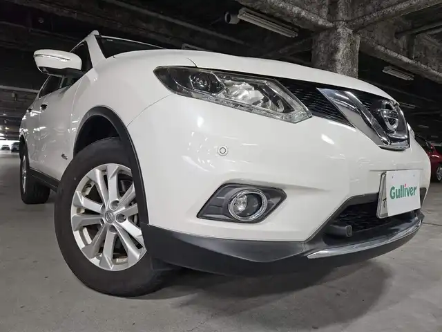 日産 エクストレイル ハイブリッド 20X エマージェンシーブレーキ 宮崎県 2016(平28)年 8.8万km ブリリアントホワイトパール 4WD/純正MOPナビ/フルセグTV/リモコンオートバックドア/アラウンドビューモニター/ビルトインETC/クルーズコントロール/エマージェンシーブレーキ/踏み間違い衝突防止アシスト/車線逸脱警報/進入禁止標識検知システム/フロント/バックソナー/LEDヘッドランプ/革巻きステアリング/ステアリングスイッチ/合皮防水シート/前席シートヒーター/純正17インチアルミホイール/スマートキー/プッシュエンジンスターター/イモビライザー/禁煙車