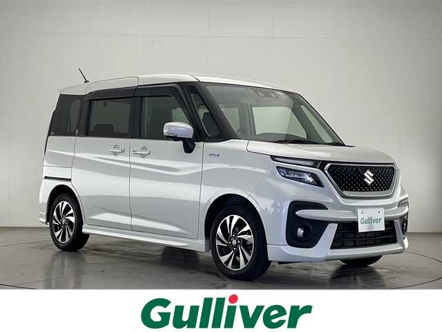 スズキ ソリオ バンディット HV MV 宮崎県 2022(令4)年 2.9万km ピュアホワイトP 禁煙車/衝突被害軽減ブレーキ/純正8型ナビTV/（CN-RZ875/CD/DVD/Bluetooth/フルセグTV)/純正ビルトインETC/純正LEDオートライト/純正LEDフォグ/純正15インチアルミ/純正エアロ/純正ルーフエンドスポイラー/純正フロアマット/両側電動スライドドア/全方位モニター/アダプティブクルーズコントロール/レーンディパーチャーアラート/クリアランスソナー/前席シートヒーター/オートエアコン/ヘッドアップディスプレイ/スマートキー/プッシュエンジンスタート/スペアキー/新車時保証書/取扱い説明書