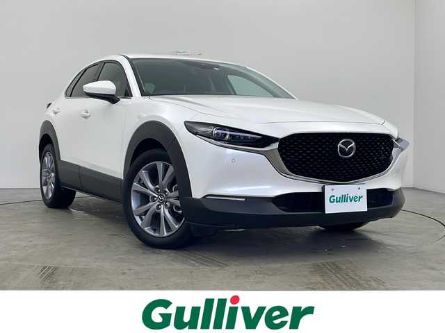 マツダ ＣＸ－３０ XD プロアクティブ 秋田県 2023(令5)年 2万km スノーフレイクホワイトパールマイカ 4WD/純正ナビ/(フルセグTV//DVD/AppleCarPlay/AndroidAuto)/バックカメラ/ヘッドアップディスプレイ/電動リアゲート/i-ActiveSense/レーダークルーズコントロール/レーンキープアシスト/横滑防止機能/衝突被害軽減システム/AT誤発進抑制制御/アイドリングストップ/プッシュスタート/スマートキー/スペアキー/革巻ステアリング/ステアリングリモコン/パドルシフト/オートライト/LEDヘッドライト/オートマチックハイビーム/電動格納ミラー/ブラインドスポットミラー/ETC/前方ドライブレコーダー/前後コーナーセンサー/社外フロアマット/純正アルミホイール/取扱説明書/保証書